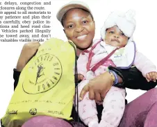  ?? PICTURE: SHELLEY KJONSTAD/ AFRICAN NEWS AGENCY (ANA) ?? Rose Nkosi with 4-month-old Lesedi. Nkosi, from Pretoria, is running her first Comrades.
