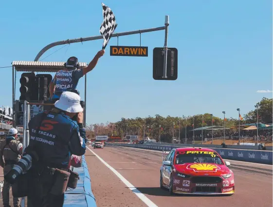  ??  ?? DJR Team Penske driver Scott McLaughlin crosses the line to win at Hidden Valley yesterday.