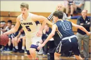  ?? Dave Phillips / For Hearst Connecticu­t Media ?? Shepaug’s Owen Hibbard (10), seen here defending, scored 48 points in an 80-49 win over Nonnewaug.