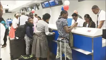  ??  ?? Major US carrier American Airlines on Thursday night began its service to Guyana. Here passengers were checking in for the outbound flight to Miami early yesterday morning. (Photo sourced from CJIA Facebook page)