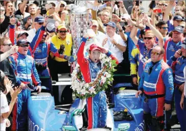  ?? JAMIE SQUIRE/GETTY IMAGES NORTH AMERICA/AFP ?? Takuma Sato of Japan celebrates in Victory Lane after winning the 101st running of the Indianapol­is 500 at Indianapol­is Motorspeed­way on May 28.