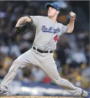  ?? Justin K. Aller Getty Images ?? AN ERROR and a lack of offense cost Rich Hill a shot at a perfect game, but he earned fans’ respect.