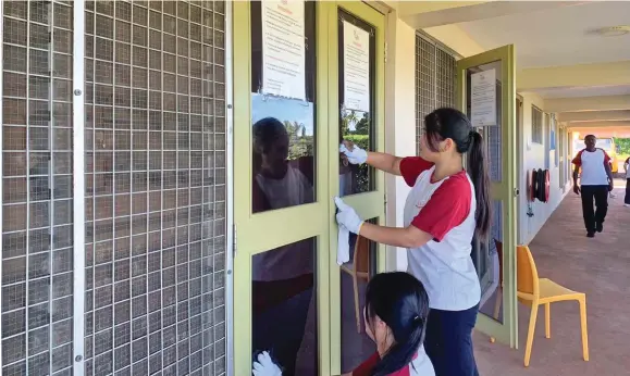  ?? Photo: Youngeun Cho ?? Students clean up St Mina Children’s Home.