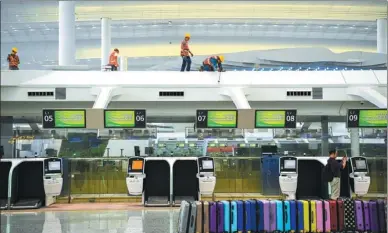  ?? ZHOU WEI / FOR CHINA DAILY ?? The new terminal at Guangzhou Baiyun Internatio­nal Airport, which will open on Thursday, is expected to handle more than 45 million passengers a year.