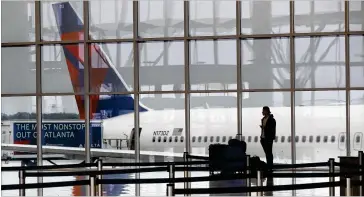  ?? CURTIS COMPTON/AJC 2020 ?? The Centers for Disease Control and Prevention on Sunday started offering free voluntary tests to arriving internatio­nal passengers at Hartsfield-jackson Internatio­nal Airport.