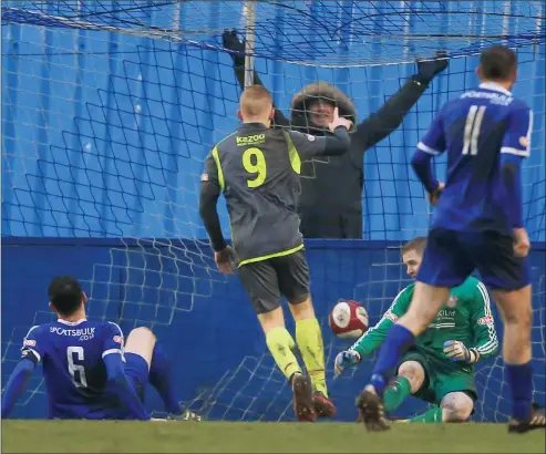  ??  ?? HAVE SOME OF THAT: Danny Glover of Hednesford Town scores to make it 2-1