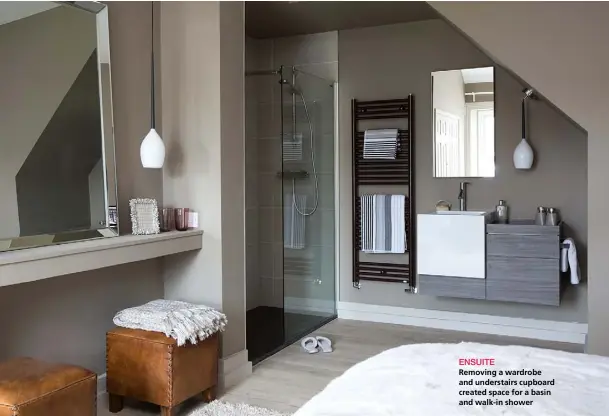  ??  ?? ENSUITE
Removing a wardrobe and understair­s cupboard created space for a basin and walk-in shower