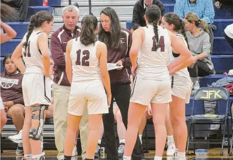  ?? Peter Wallace/For Hearst Connecticu­t Media ?? Torrington coach Mike Fritch brought his team to a near-miss comeback in an NVL Girls Basketball Tournament semifinal loss to St. Paul Catholic Monday night at Kennedy High School.