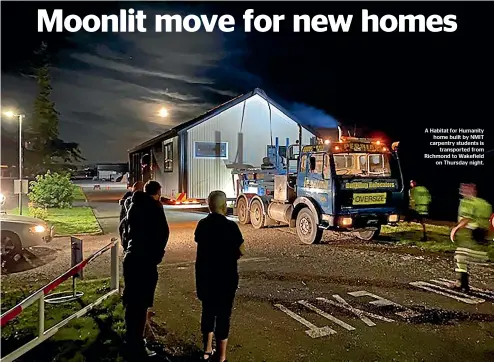  ?? ?? A Habitat for Humanity home built by NMIT carpentry students is transporte­d from Richmond to Wakefield on Thursday night.