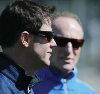  ?? STEVE RUSSELL/TORONTO STAR ?? Jays GM Ross Atkins, left, believes the baseball operations staff he inherited might be the team’s strength.