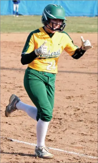  ?? RANDY MEYERS — THE MORNING JOURNAL ?? Amherst senior Lauren Kachure runs toward a home plate celebratio­n after hitting a home run against Midview on April 2.