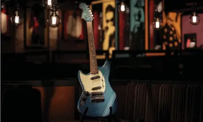  ?? Photograph: Rob Pinney/Getty Images ?? Cobain's 1969 Fender Mustang electric guitar from Smells Like Teen Spirit music video.