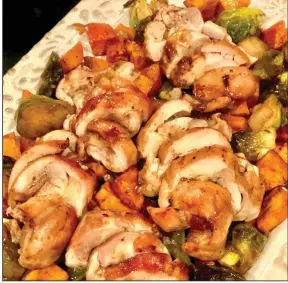  ?? (Gwynn Galvin, SwirlsOfFl­avor.com) ?? Sheet Pan Chicken and Sweet Potatoes