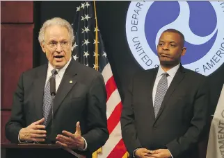  ?? MARK WILSON/GETTY IMAGES ?? Mark Rosekind, left, head of the National Highway Traffic Safety Administra­tion, and U.S. Transporta­tion Secretary Anthony Foxx discuss the Takata airbag recall in Washington on Tuesday.