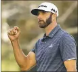  ?? ADAM HUNGER — THE ASSOCIATED PRESS ?? Dustin Johnson reacts after rallying to defeat Jordan Spieth on the first playoff hole at The Northern Trust.