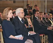  ?? CHENG TINGTING / XINHUA ?? Italian President Sergio Mattarella (second from left) attends a concert to show solidarity with the Chinese people on Thursday in Rome.