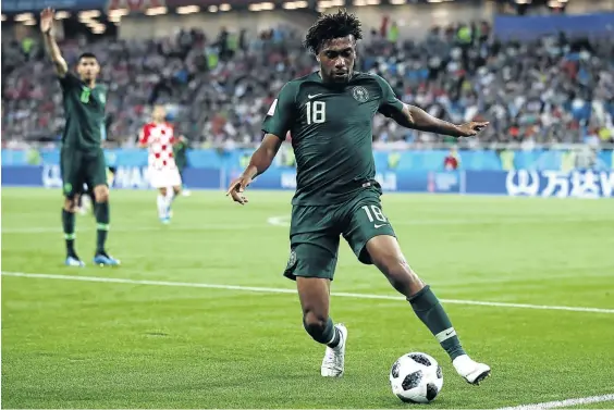  ?? / JULIAN FINNEY/GETTY IMAGES ?? Alex Iwobi and his Nigerian team are among the youngest squads at the World Cup.