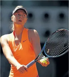  ?? JULIAN FINNEY/GETTY IMAGES ?? Maria Sharapova of Russia in action in her match against Mirjana LucicBaron­i of Croatia during day two of the Mutua Madrid Open tennis at La Caja Magica on Sunday in Madrid, Spain. Sharapova plays Eugenie Bouchard on Monday.