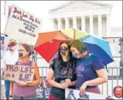  ?? AP ?? Abortion-rights activists outside the Supreme Court on Friday.