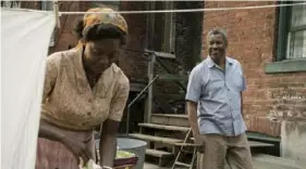  ?? David Lee/Paramount Pictures ?? Viola Davis and Denzel Washington star in “Fences.” The 2016 movie based on August Wilson's most celebrated play was shot in Pittsburgh and will be shown April 16 at the Carrie Furnaces in Swissvale.