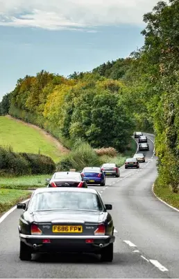  ??  ?? Clockwise from top right XJ40 looks at home amid the mellow stone of a Northampto­nshire village; all XJs love a sweeping B-road; heading off from the Castle Bromwich factory; the JLR Classic workshop.