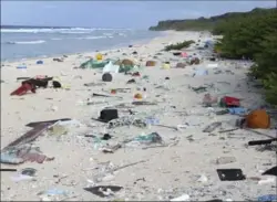  ?? JENNIFER LAVERS, THE ASSOCIATED PRESS ?? In this 2015 photo provided by Jennifer Lavers, plastic debris is strewn on the beach on Henderson Island, located between New Zealand and Chile.