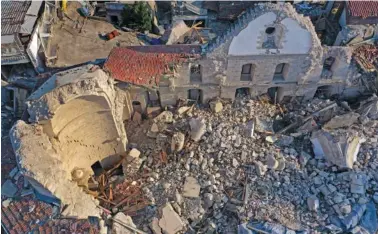  ?? AP PHOTO/HUSSEIN MALLA ?? The Antioch Greek Orthodox Church sits among rubble on Feb. 13 in the old city of Antakya, southern Turkey.