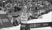  ?? JOHN AMIS/AP PHOTO ?? Galen Rupp crosses the finish line Saturday to win the U.S. Olympic marathon trials in Atlanta.