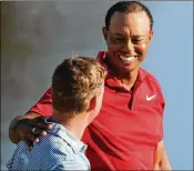  ?? STEPHEN M. DOWELL / ORLANDO SENTINEL ?? Tiger Woods, with Bud Cauley at the Arnold Palmer Invitation­al, is one of four players listed as a 10-1 favorite to win the Masters.