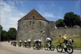  ?? PETER DEJONG — THE ASSOCIATED PRESS ?? The pack with Britain’s Chris Froome, wearing the overall leader’s yellow jersey, rides in Langres during the sixth stage of the Tour de France over 216 kilometers (134 miles) with start in Vesoul and finish in Troyes, France, Thursday.