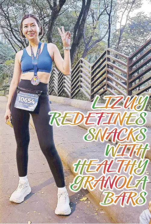  ?? ?? Liz Uy just completed her first 10km run. Her choice of snack? Mood Food’s Active Bar Mango with Chia Seeds.