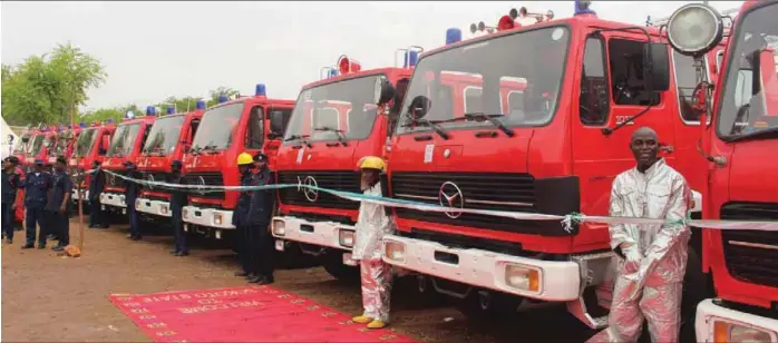  ??  ?? The new vehicles for firefighti­ng procured by Governor AminuTambu­wal