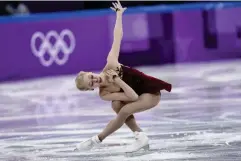  ?? (AFP/Getty) ?? US figure skating champion Bradie Tennell laces up her left skate first