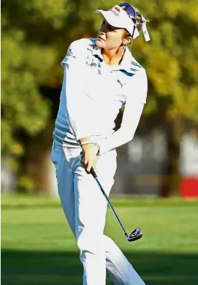  ??  ?? Lexi Thompson hitting her second shot on the 13th hole during the first round of the Indy Women in Tech Championsh­ip on Thursday. — AFP Flying start: