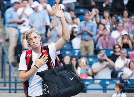  ?? PHOTOS: NATHAN DENETTE/THE CANADIAN PRESS ?? Denis Shapovalov waves to the crowd after the Canadian was defeated in quick fashion 7-5, 6-2 by Robin Haase of the Netherland­s on Thursday night in the third round of the Rogers Cup at the Aviva Centre in Toronto.