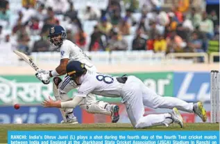  ?? ?? RANCHI: India’s Dhruv Jurel (L) plays a shot during the fourth day of the fourth Test cricket match between India and England at the Jharkhand State Cricket Associatio­n (JSCA) Stadium in Ranchi on February 26, 2024. — AFP