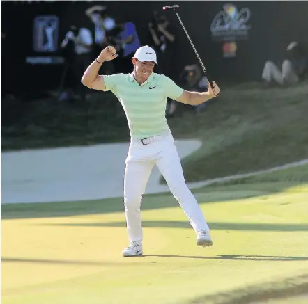  ?? — GETTY IMAGES ?? Rory McIlroy of Northern Ireland celebrates after making his birdie putt on the 18th green Sunday en route to winning the Arnold Palmer Invitation­al by three strokes in Orlando, Fla.