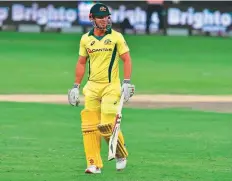  ?? AFP ?? Australia’s Chris Lynn walks back during one of the T20 matches against Pakistan. Australia were thrashed 3-0.