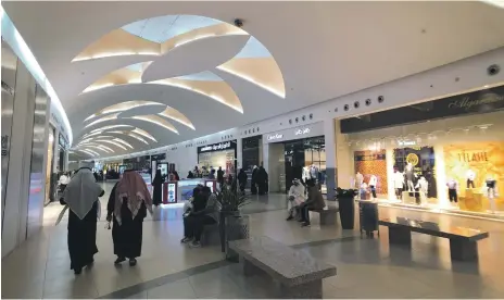  ?? Reuters ?? Shoppers at the Mall of Dhahran in Saudi Arabia, where citizens will continue to receive allowances from the government