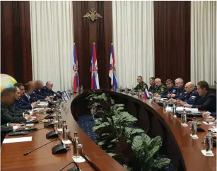  ?? (IDF) ?? MEMBERS OF the Israeli and Russian delegation­s meet in Moscow last week.