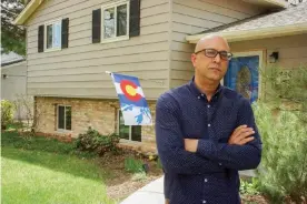  ??  ?? Tony Pigford, a Black, fourth-generation Denverite, in front of his home Photograph: Will Tracey