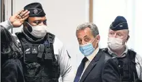  ?? PHOTO: GETTY IMAGES ?? Fall from grace . . . Former French president Nicolas Sarkozy arrives at the Paris court house yesterday to hear the verdict in his corruption trial.