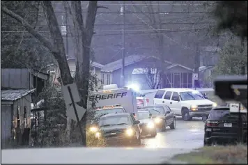  ?? TODD J. VAN EMST / ASSOCIATED PRESS ?? A man suspected in the killings of three women is dead after a standoff Tuesday with police at a Georgia motel, and a female suspect has been arrested, a U.S. Marshals Service spokesman said.