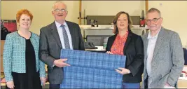  ??  ?? Left to right: Carol Somerville, D R MacDonald and Catherine Gomez from Bethesda with HTH chairman Brian Wilson displaying the new Bethesda Harris Tweed.