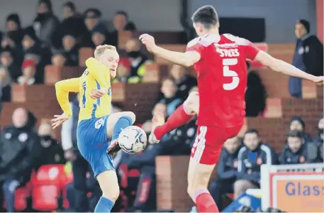  ?? ?? Alex Pritchard, pictured, left, battling for possession with Accrington’s Ross Sykes, is set for a short spell on the sidelines.