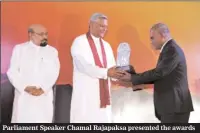  ??  ?? Parliament Speaker Chamal Rajapaksa presented the awards