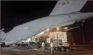  ?? BOB GARLOCK / STAFF ?? AWright-PattersonA­irForceRes­erveC-17crewunlo­ads hurricane relief supplies atHomestea­dAir Reserve Base inFloridao­nSept. 12.