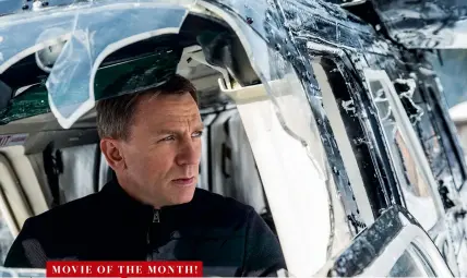  ??  ?? movie of the month!
ABOVE Bond (Daniel Craig), moments after kicking a bad guy out of a moving helicopter. And we thought our job was dangerous