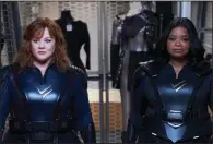  ??  ?? Melissa McCarthy and Octavia Spencer are middle-aged friends who become superheroe­s in the Netflix film “Thunder Force,” written and directed by McCarthy’s husband and creative partner, Ben Falcone.