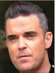  ??  ?? „ Robbie Williams made fun of himself in a 2013 album.